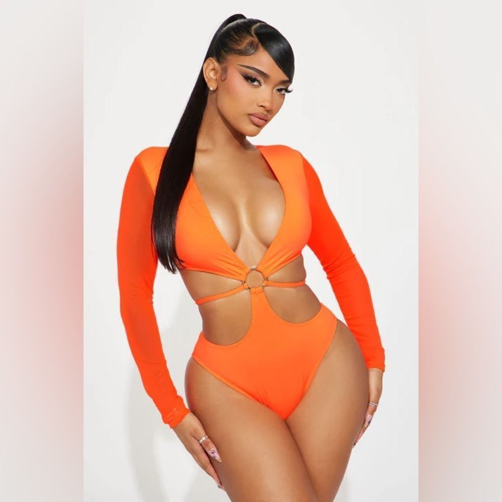 Vibrant Orange Cutout Swimsuit • Catching Waves Long Sleeve 1 Piece Swimsuit
